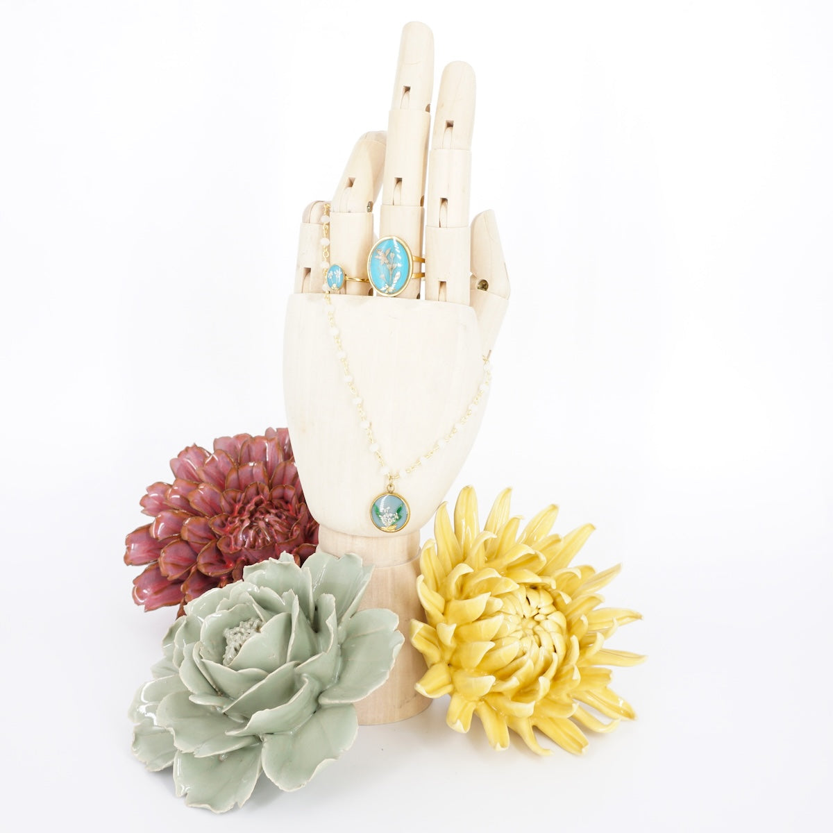 Collana fiori bottone rosario celeste COLLANA BOTTONE ROSARIO CELESTE ANNA FADDA