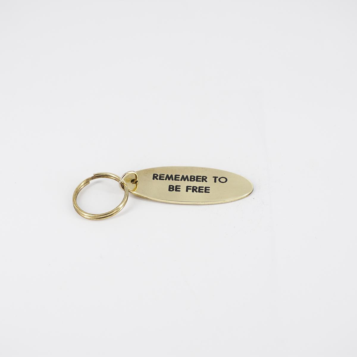Oval key ring REMEMBER TO BE FREE