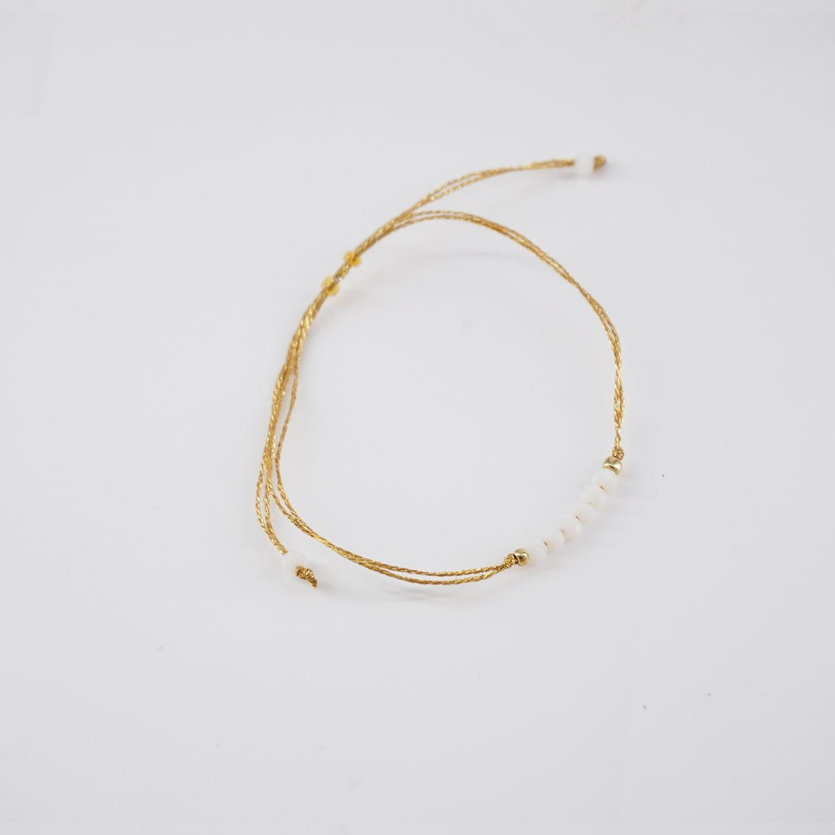 Braccialetto PERLINE FILO BIANCO BRACCIALETTO PERLINE FILO BIANCO NUSA DUA