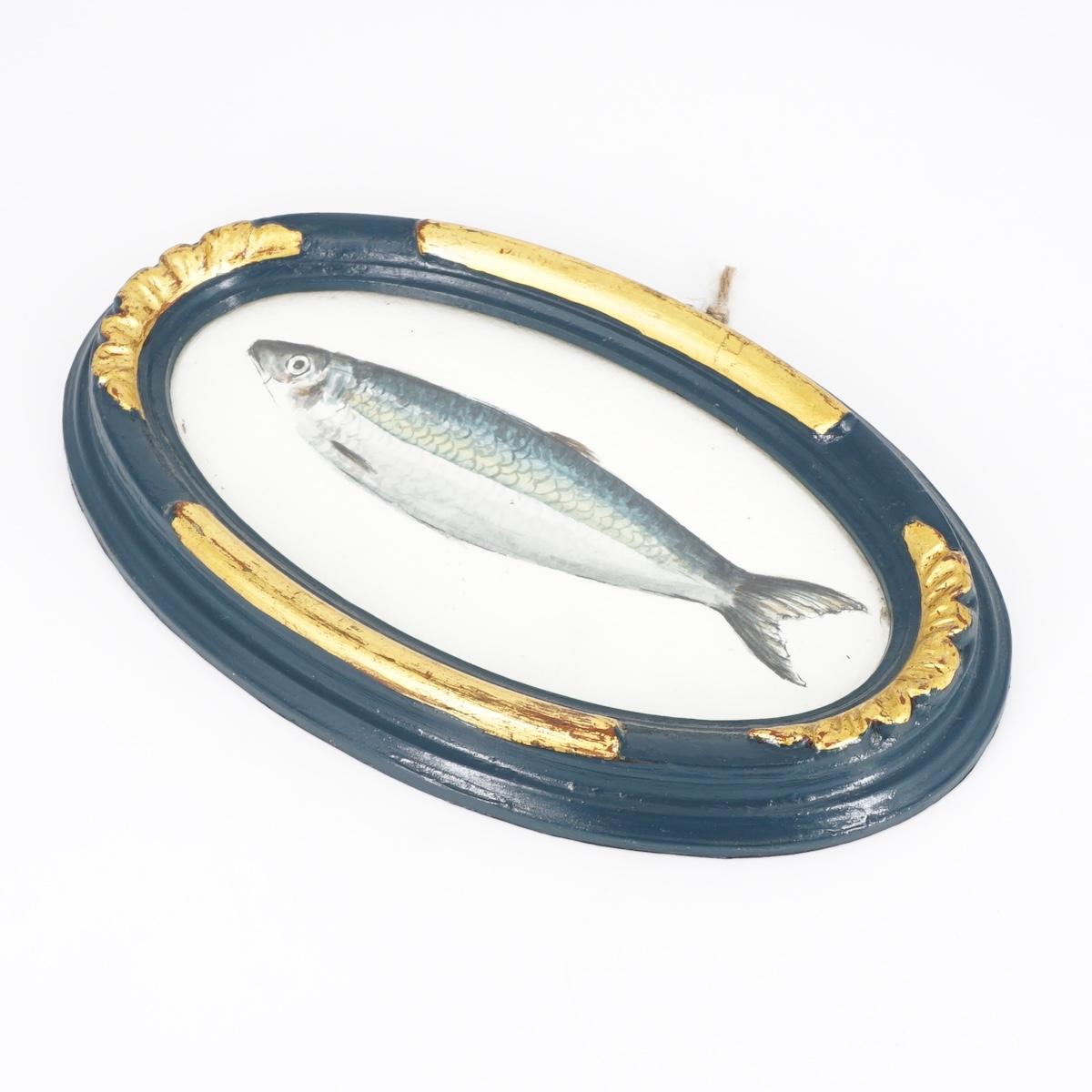 Quadretto ARINGA CORNICE OVALE BLU E ORO ARINGA CORNICE OVALE BLU E ORO  CATERINA BERTA