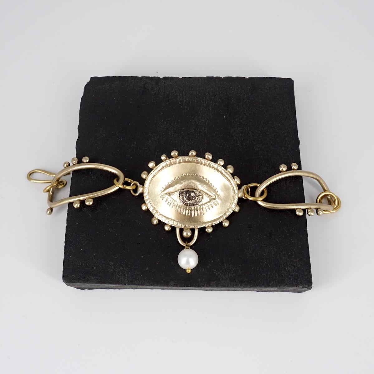 BRACCIALE OCCHIO CON PERLA