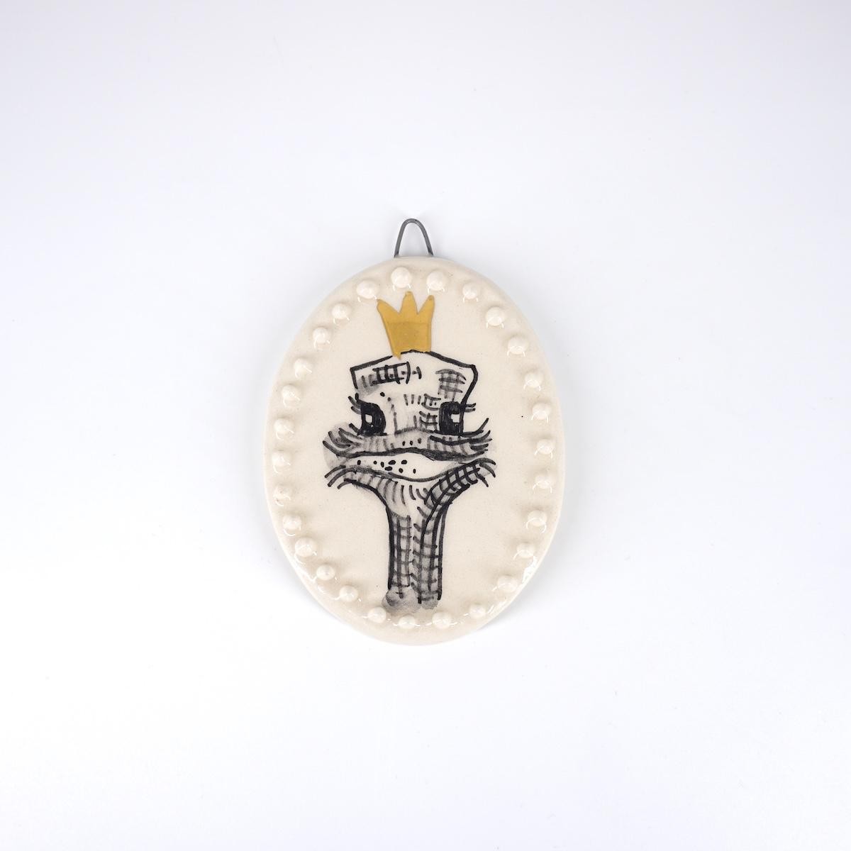 AUTRUCHE ovale avec couronne fond blanc avec bulles