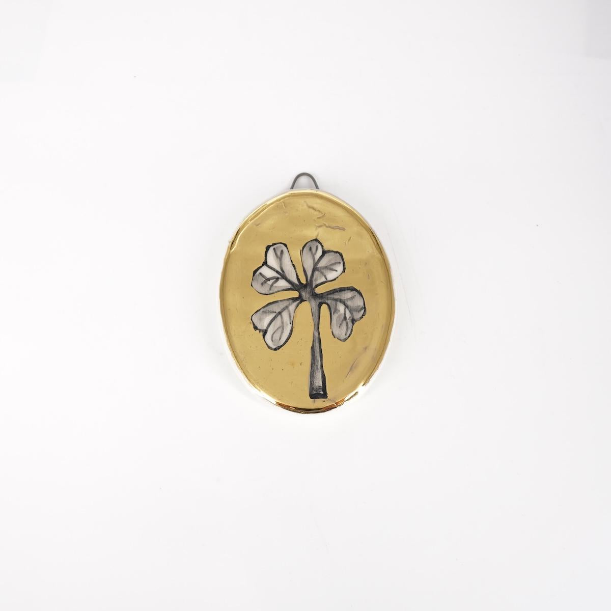 Ovalino QUADRIFOGLIO fondo oro liscio