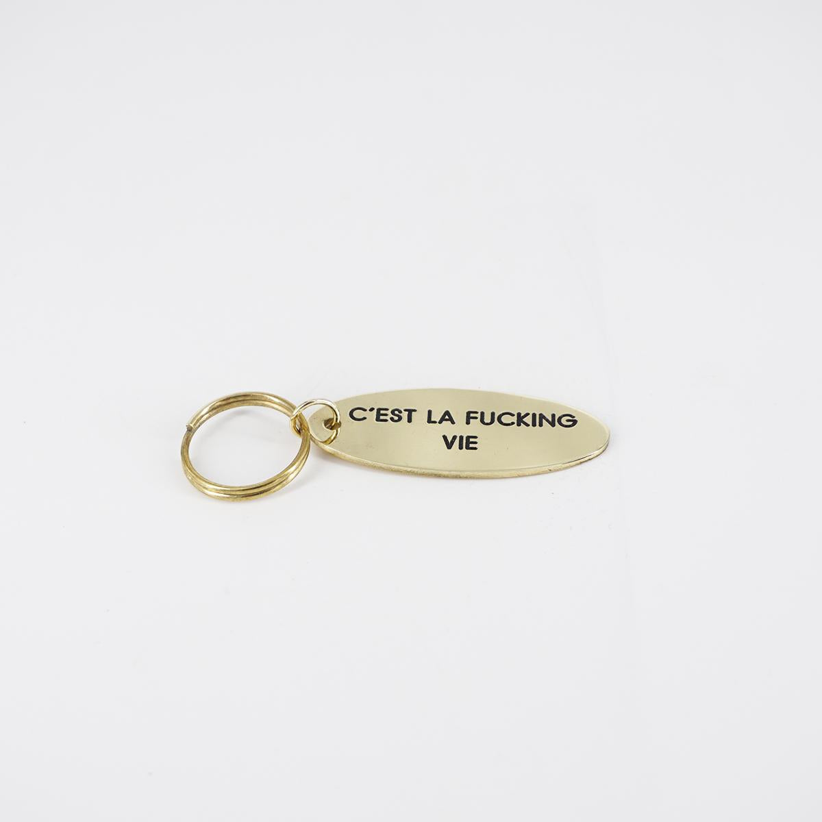 Portachiavi ovale C'EST LA FUCKING VIE