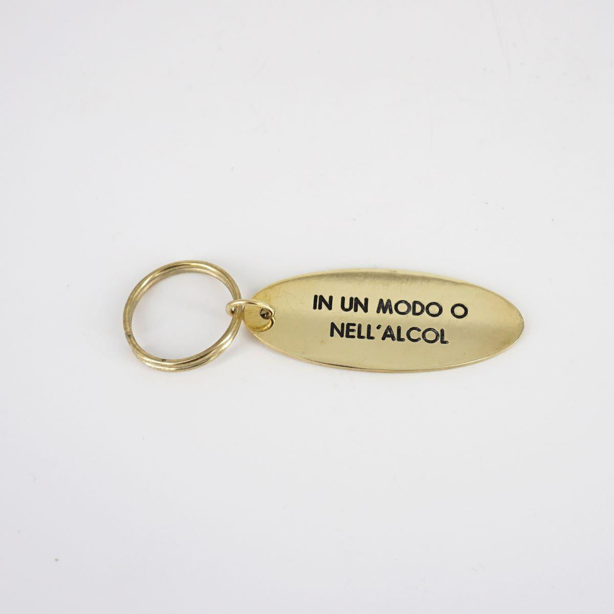 Portachiavi ovale IN UN MODO O NELL'ALCOL