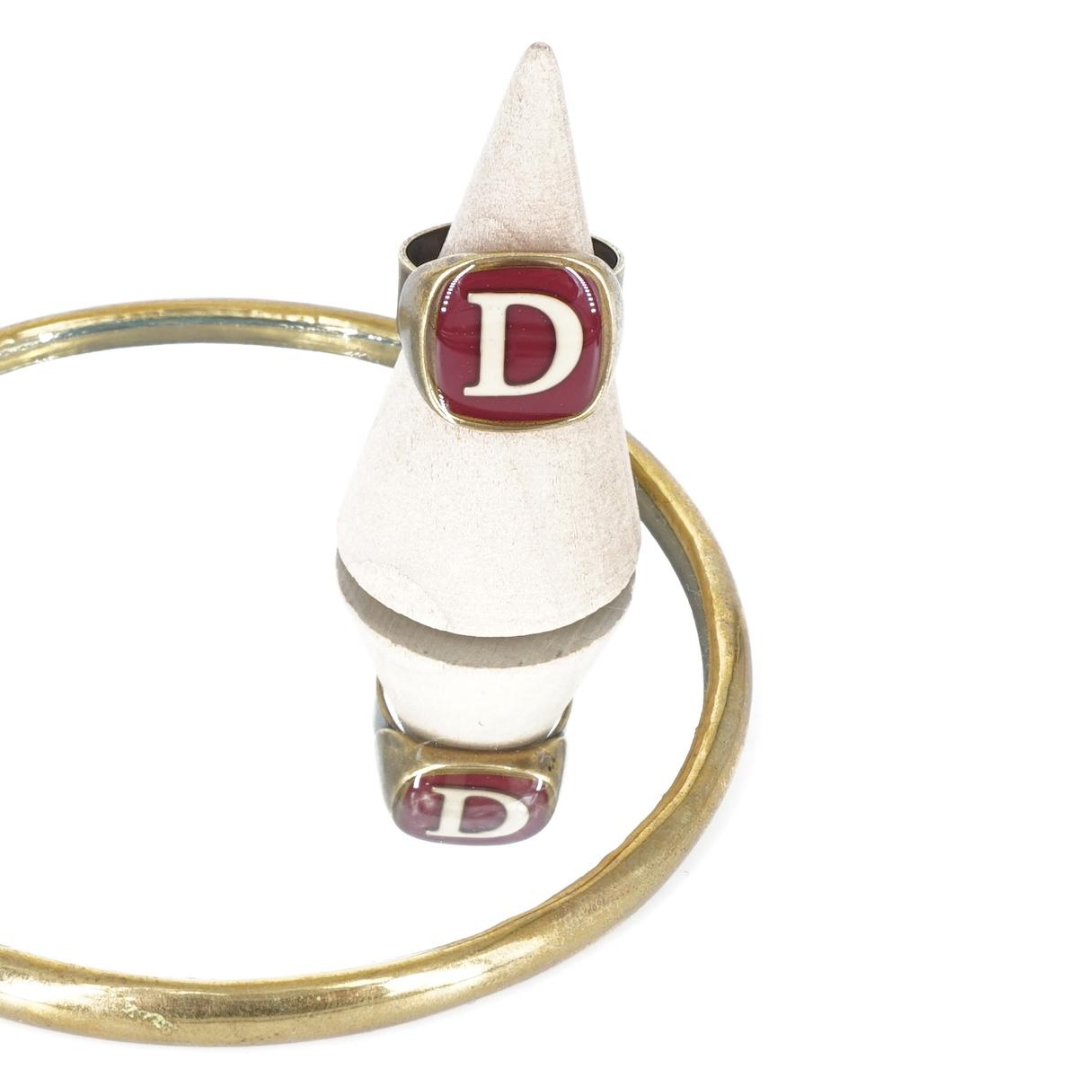 ANELLO LETTERA D BORDEAUX ANELLO LETTERA D BORDEAUX E AVORIO UNIQUE UNCONVENTIONAL DETAILS