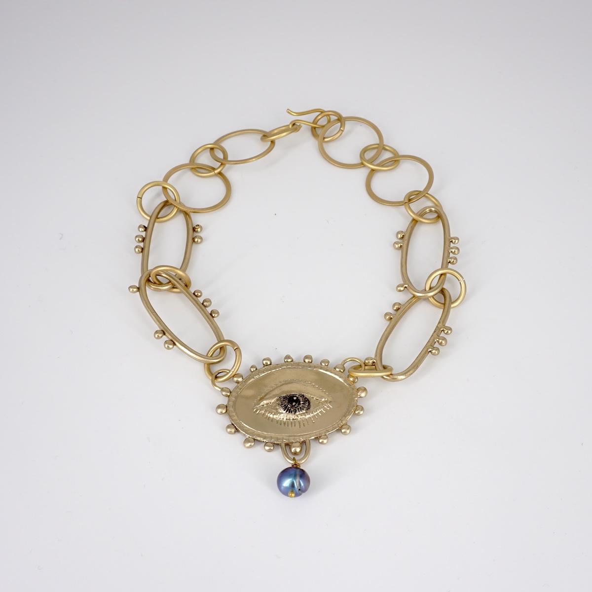 COLLANA OCCHIO CON PERLA BLU COLLANA OCCHIO CON PERLA BLU NEFELI