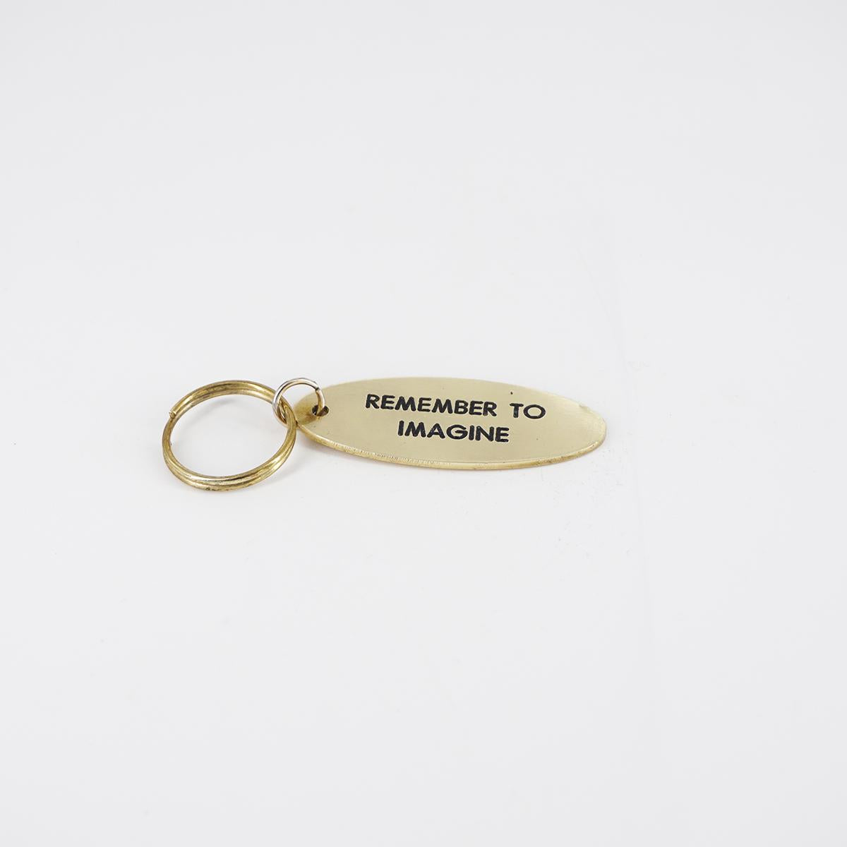 REMEMBER TO IMAGINE oval key ring