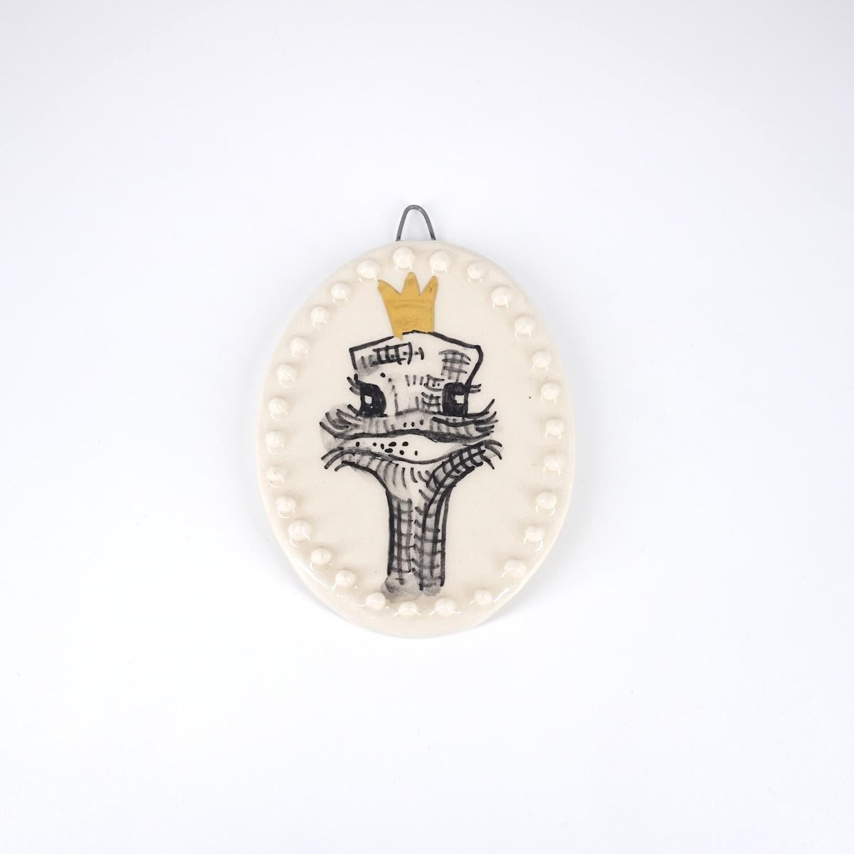 AUTRUCHE ovale avec couronne fond blanc avec bulles