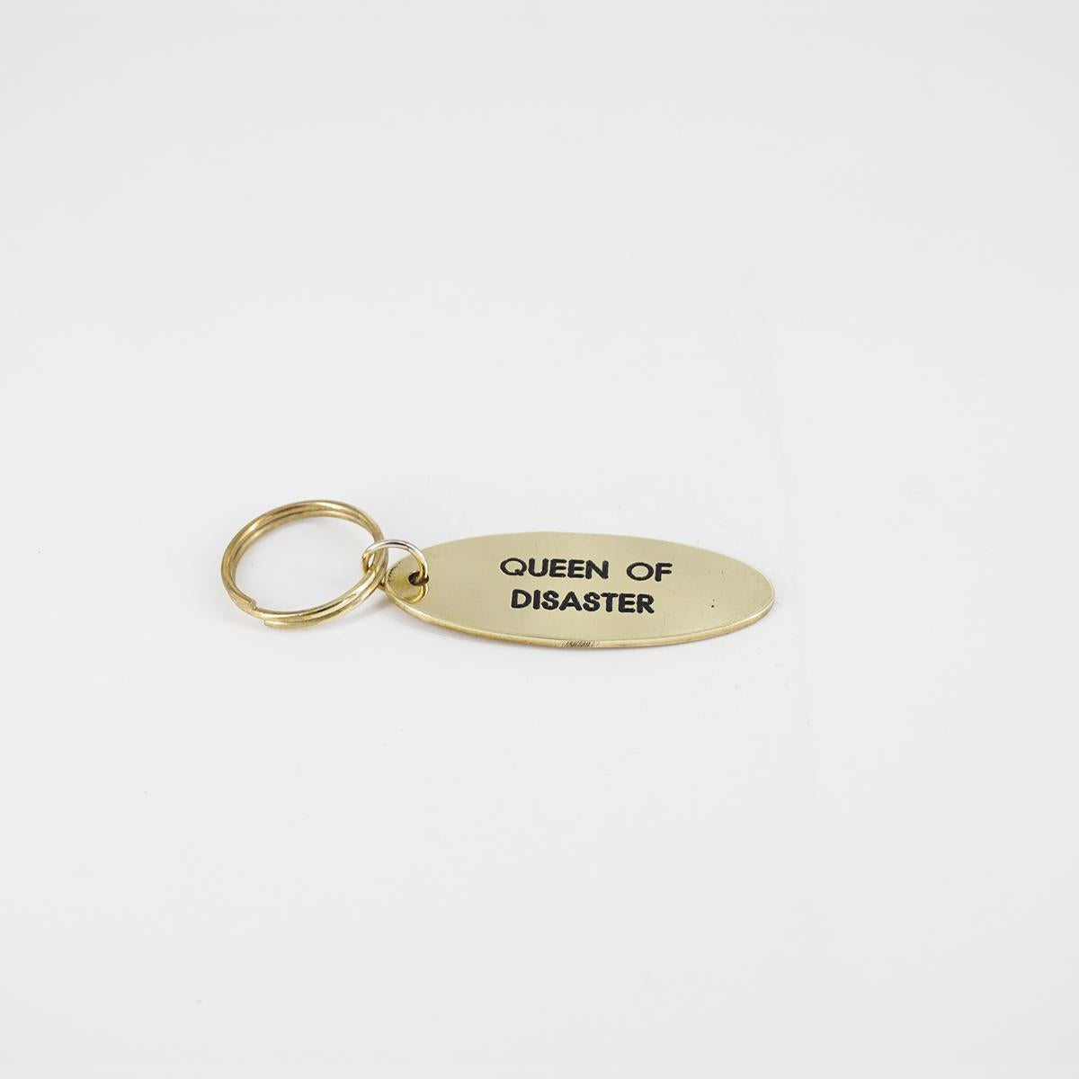 QUEEN OF DISASTER Oval Keychain