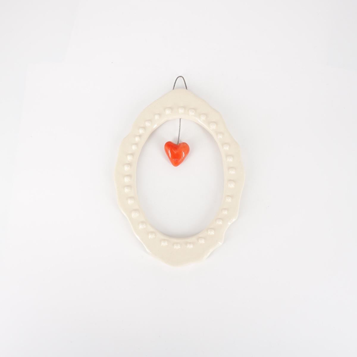 CORNICE S OVALE CUORE ROSSO BOLLICINE BIANCO