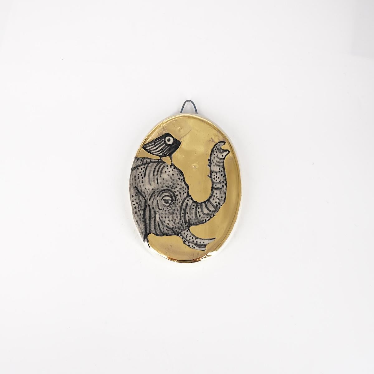 Ovalino ELEFANTE con uccellino fondo oro liscio