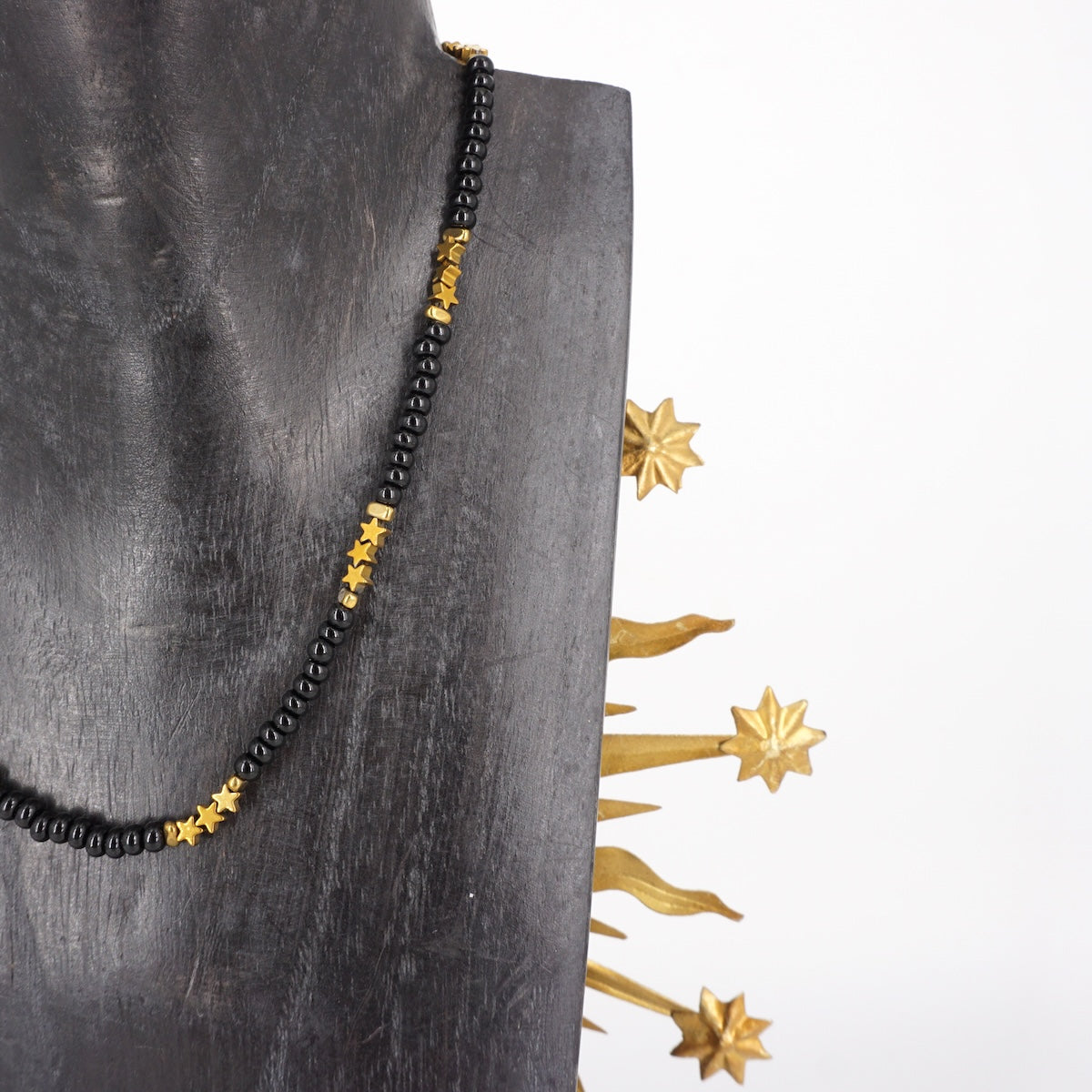 COLLANA CON STELLINE IN EMATITE NERA COLLANA STELLINE IN EMATITE NERA ALMARE' 