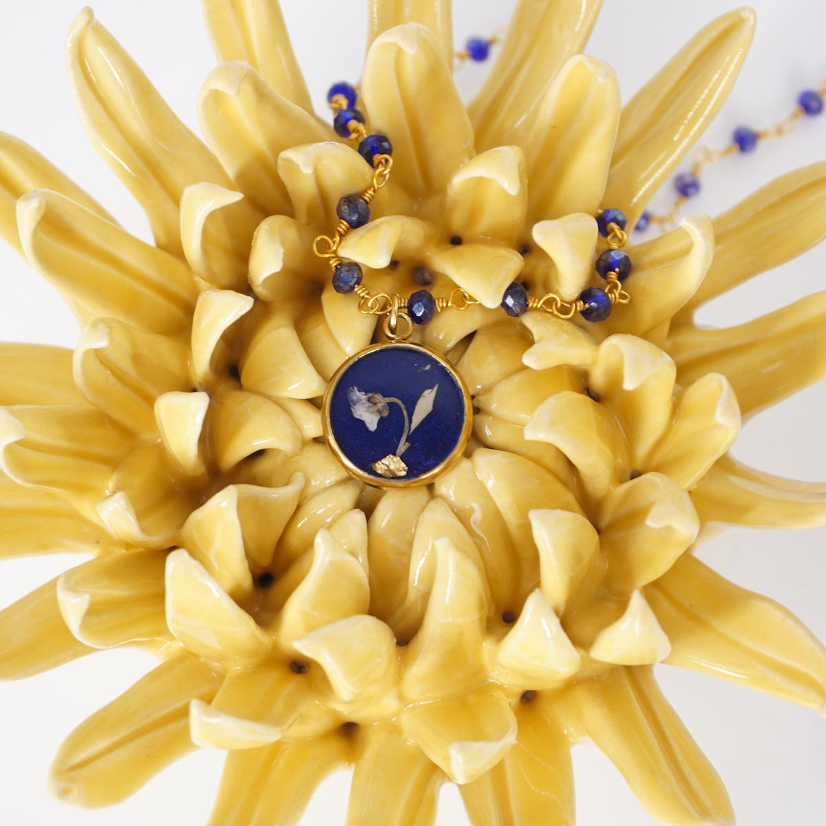 Collana fiori bottone rosario Blu COLLANA BOTTONE ROSARIO BLU ANNA FADDA 