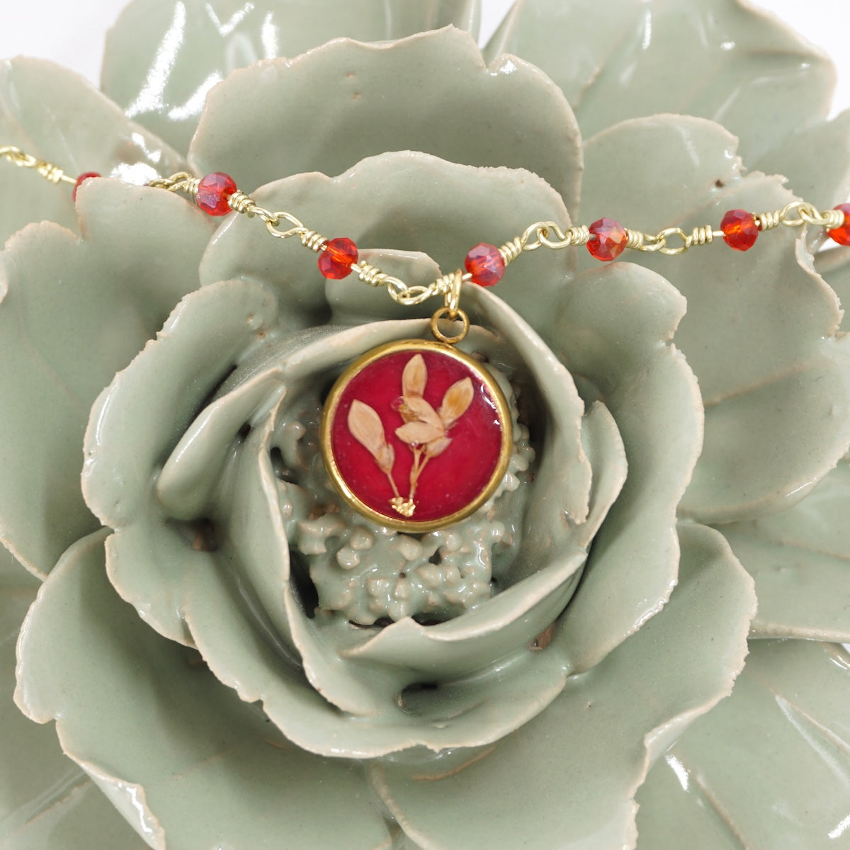 Collana fiori bottone rosario Ciclamino COLLANA BOTTONE ROSARIO CICLAMINO ANNA FADDA 