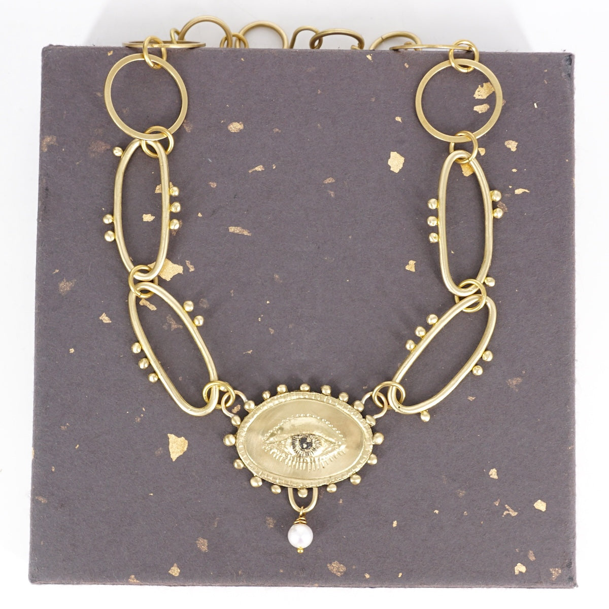 COLLANA OCCHIO CON PERLA COLLANA OCCHIO CON PERLA BIANCA  NEFELI 