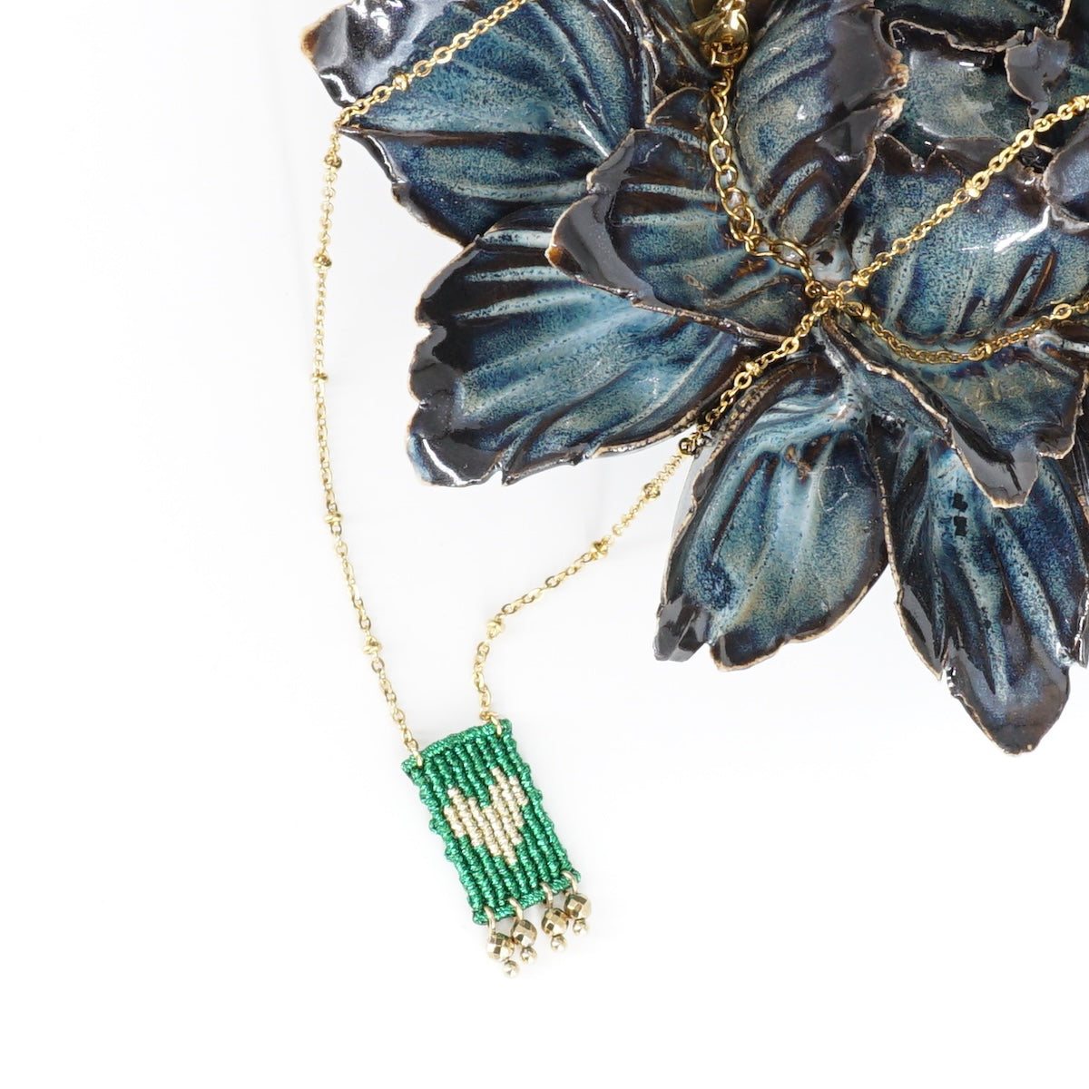 COLLANA TALISMANO MINI CUORE VERDE METALLIZZATO COLLANA TALISMANO MINI CUORE VERDE METALLIZZATO NOMADEA 