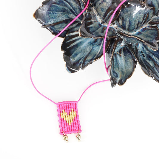 COLLANA TALISMANO CORDINO CUORE FUCSIA COLLANA TALISMANO TESSUTO CUORE FUCSIA NOMADEA 