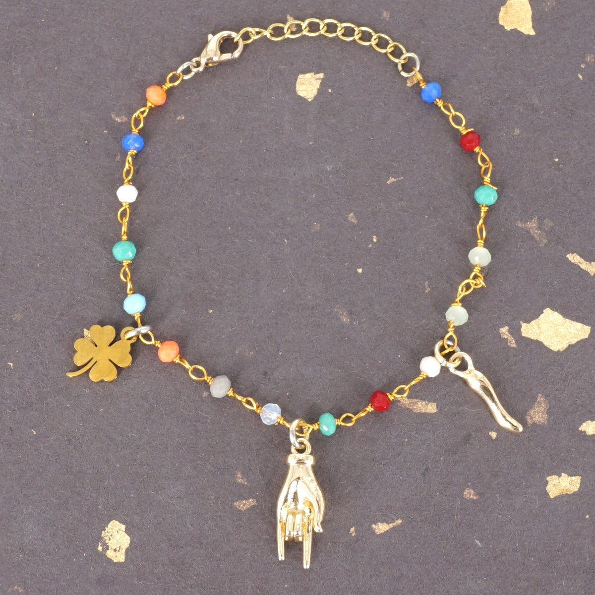 BRACCIALE ROSARIO TRE CHARM MANO TIè BRACCIALE ROSARIO TRE CHARM MANO TIÈ ORO SVEVA 