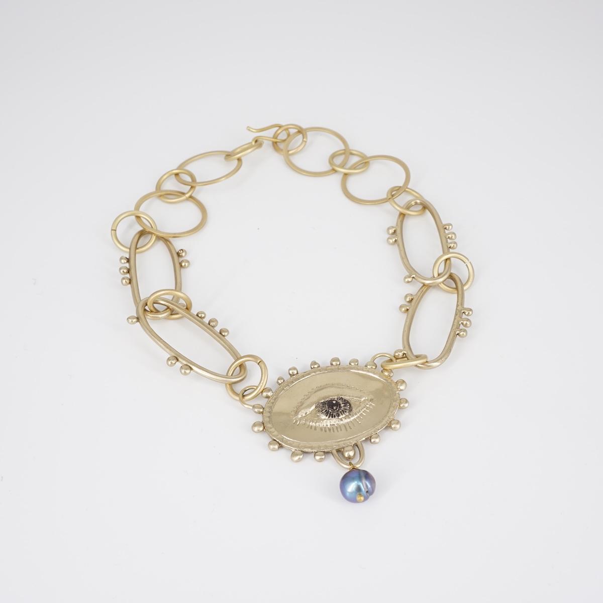 COLLANA OCCHIO CON PERLA BLU COLLANA OCCHIO CON PERLA BLU  NEFELI 