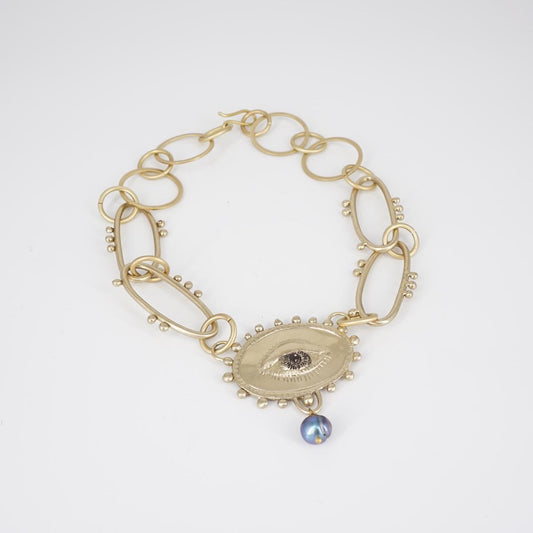 COLLANA OCCHIO CON PERLA BLU COLLANA OCCHIO CON PERLA BLU  NEFELI 