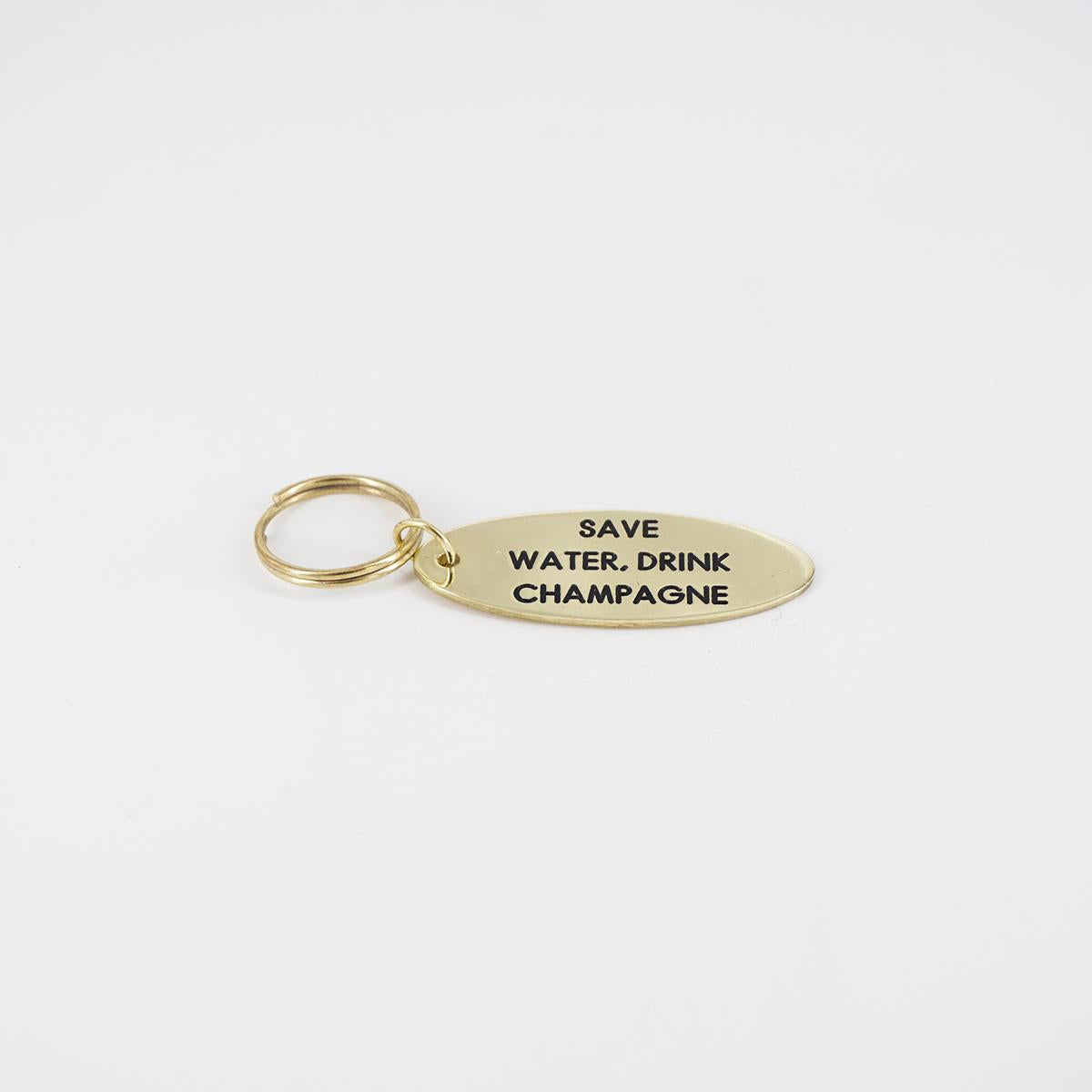 BERC SOPHIE PORTACHIAVI OVALESAVE WATER, DRINK CHAMPAGNE