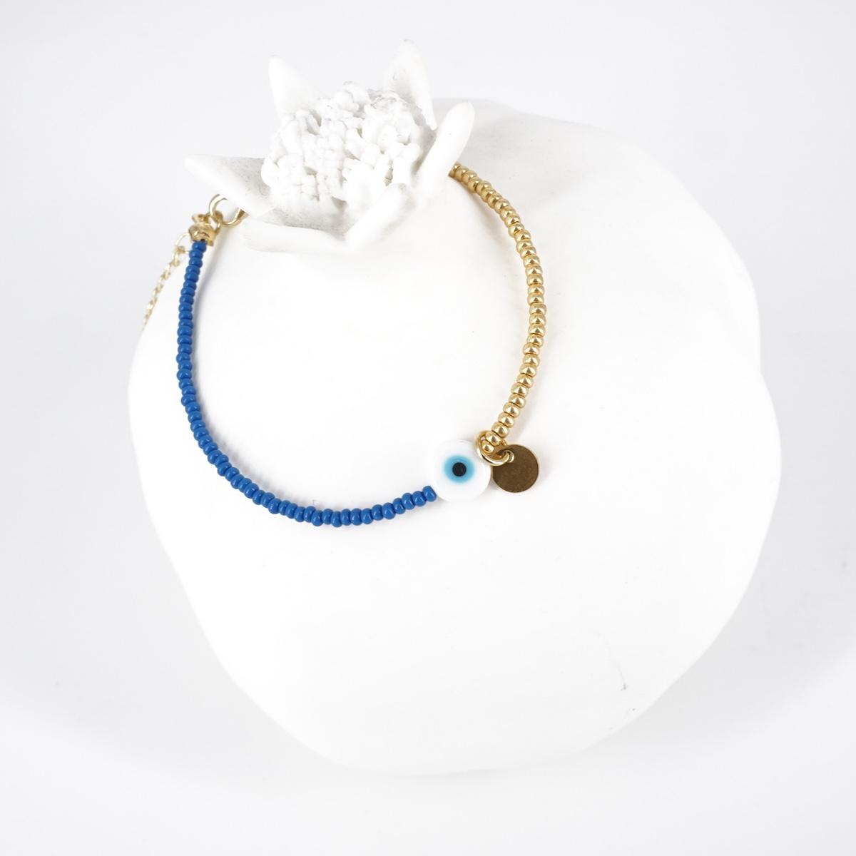 BRACCIALE OCCHIO PERLINE ORO E BLU BRACCIALE OCCHIO PERLINE BLU E ORO SOPHIE GIOIELLI 