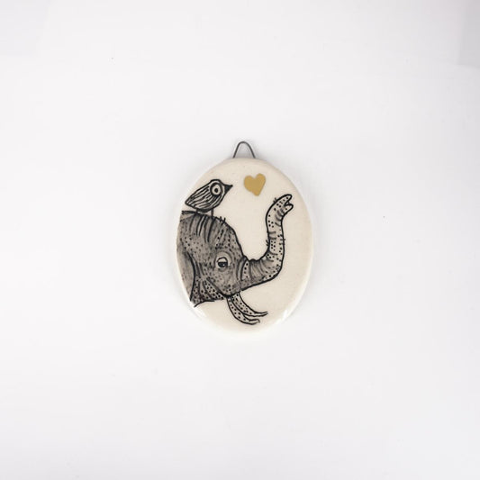 Ovalino ELEFANTE con uccellino fondo bianco liscio