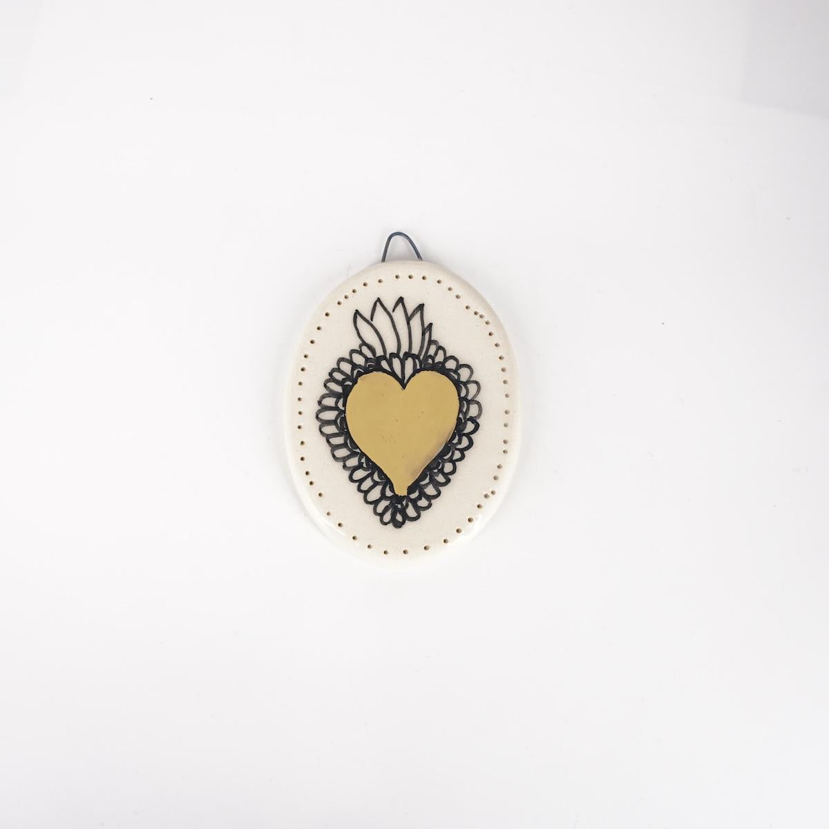 Ovalino EXVOTO fondo bianco forato