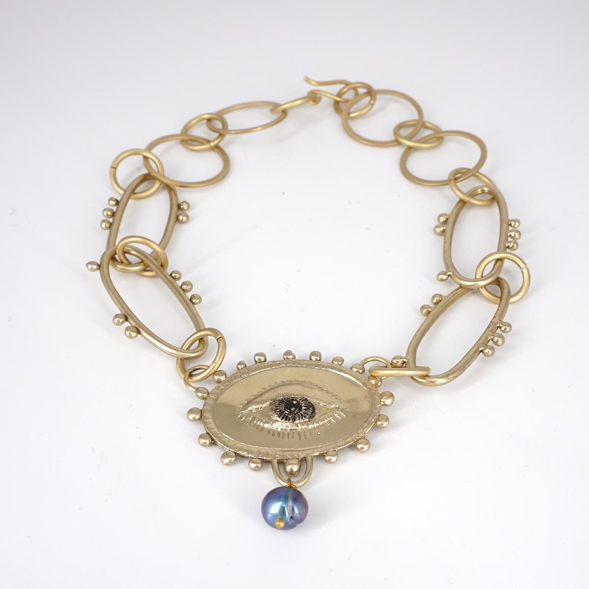 COLLANA OCCHIO CON PERLA BLU COLLANA OCCHIO CON PERLA BLU  NEFELI 