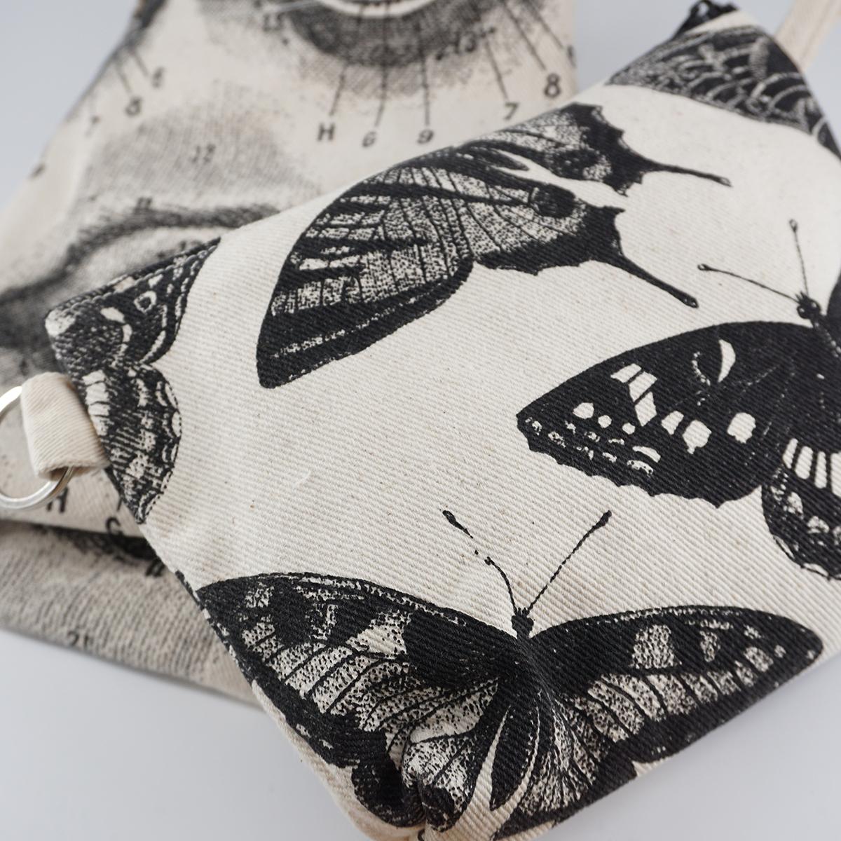 Pochette con manico farfalle notturne