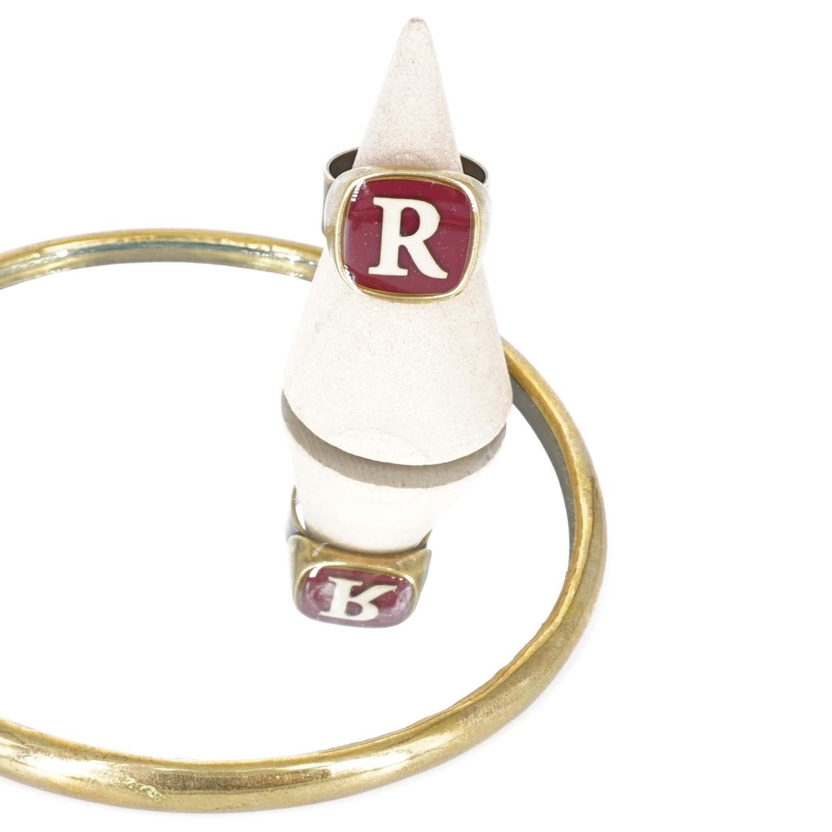 ANELLO LETTERA R BORDEAUX ANELLO LETTERA R BORDEAUX E AVORIO UNIQUE UNCONVENTIONAL DETAILS 