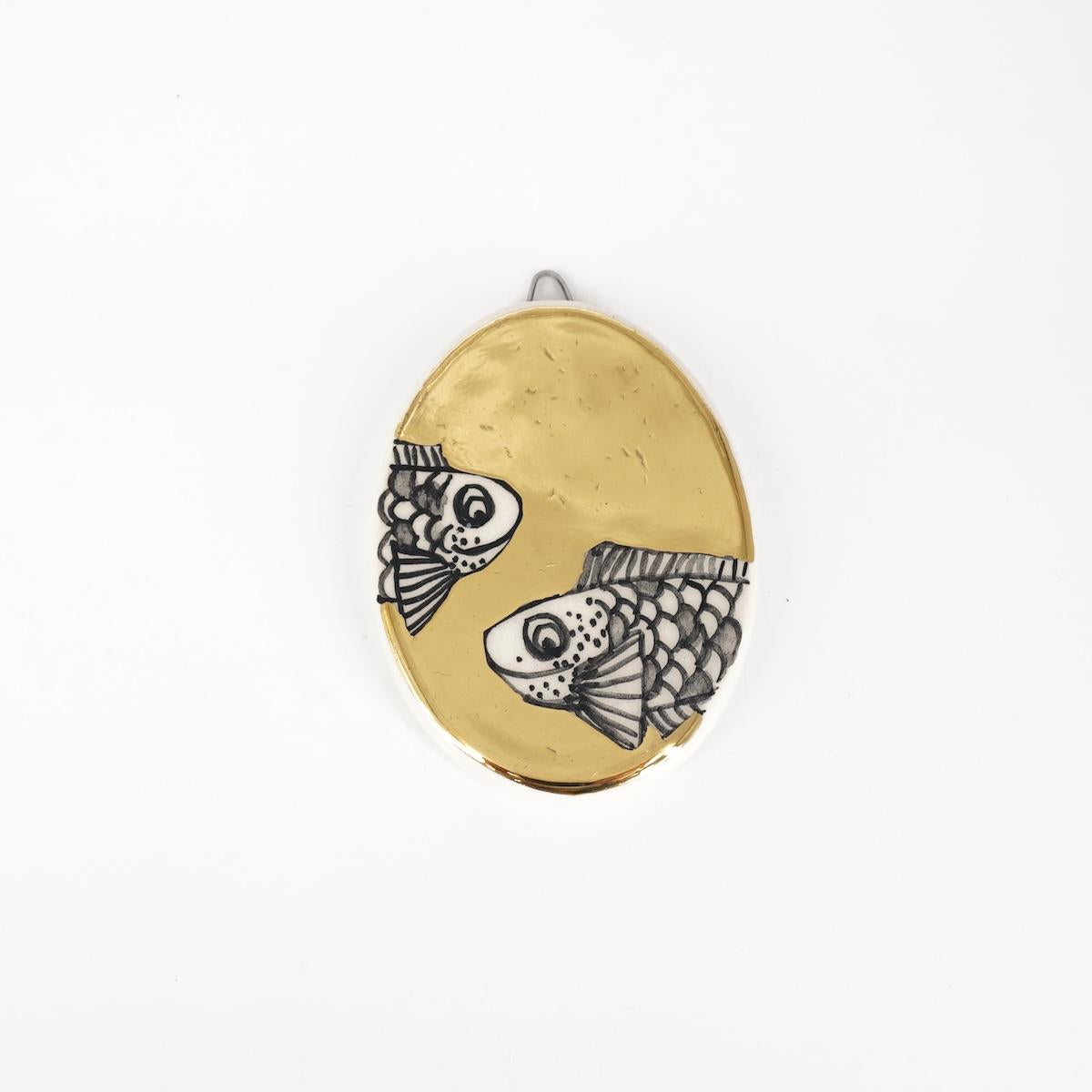 Ovalino PESCI fondo oro liscio