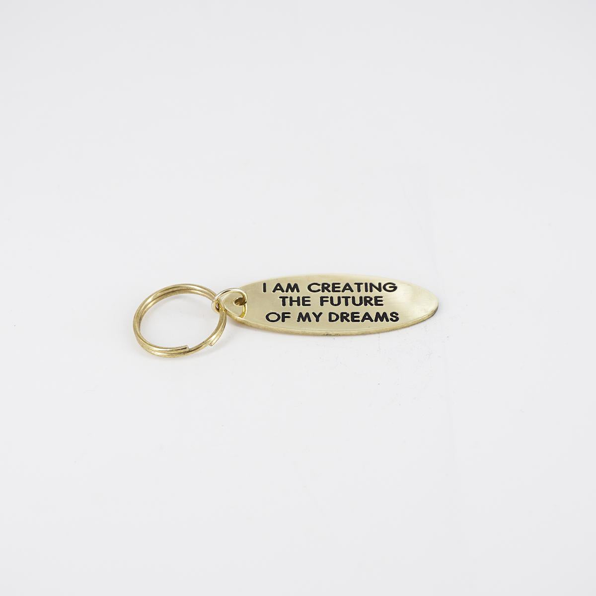 Portachiavi ovale I AM CREATING THE FUTURE OF MY DREAMS