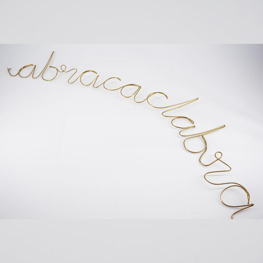 Scritta lineare abracadabra