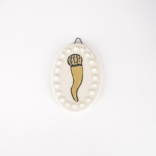 Ovalino CORNETTO fondo bianco con bollicine