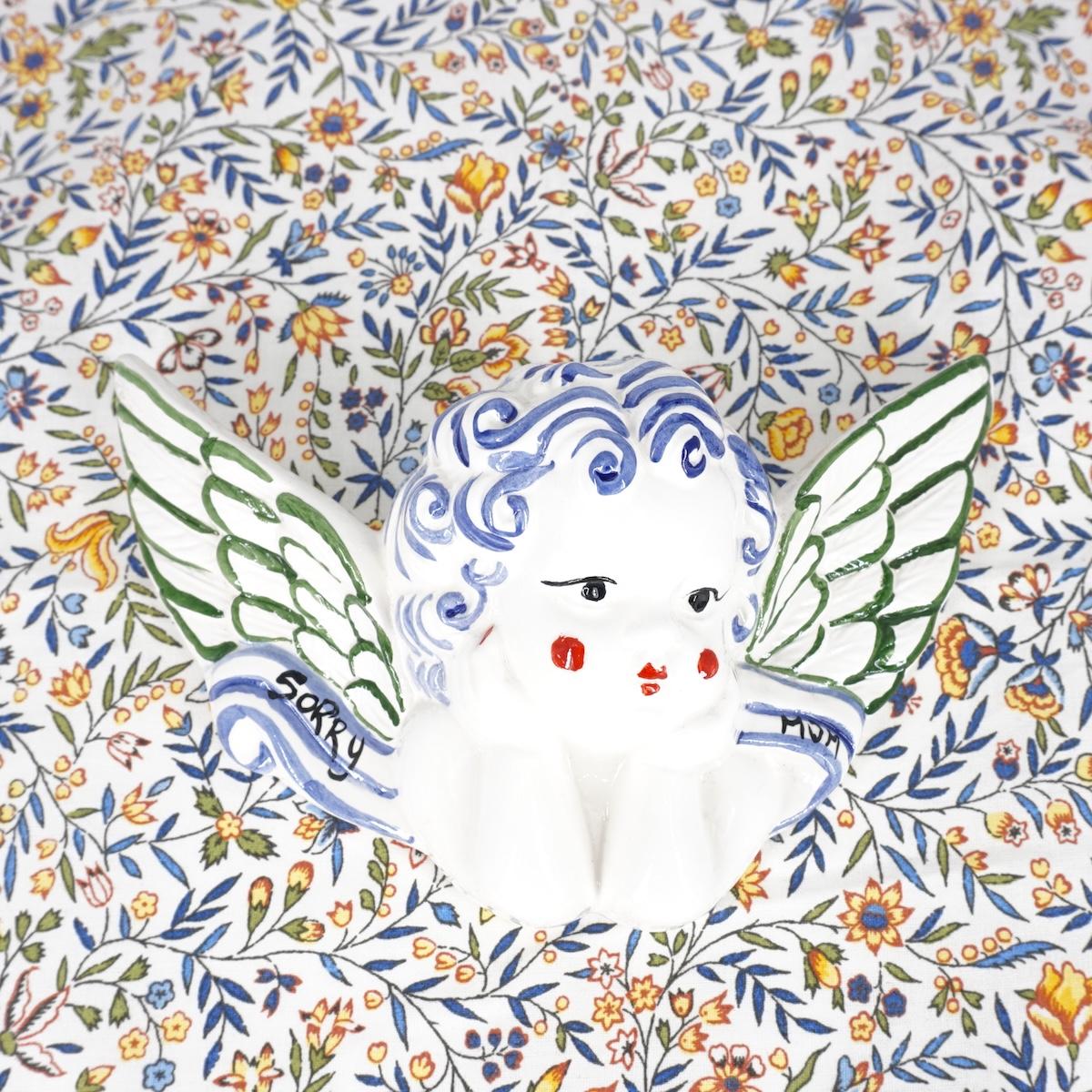 Angioletto linea SORRY MUM con ali verdi ANGELO LINEA CAPELLI BLU SORRY MUMALI VERDI ZENJI CERAMICS 