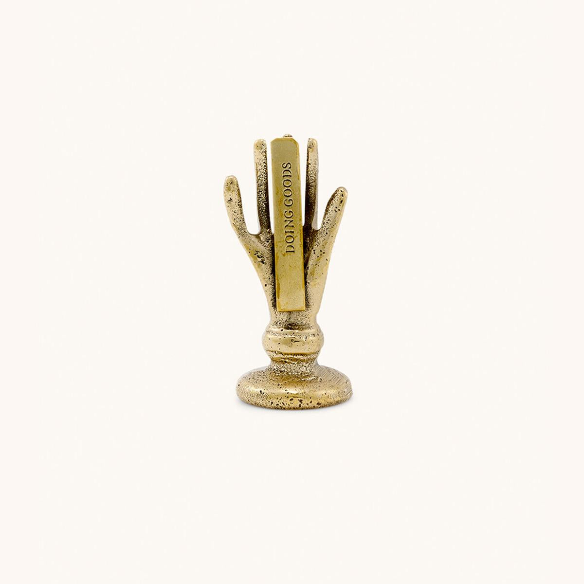 Manina segnaposto dorata MANO SEGNAPOSTO ORO DOING GOODS 