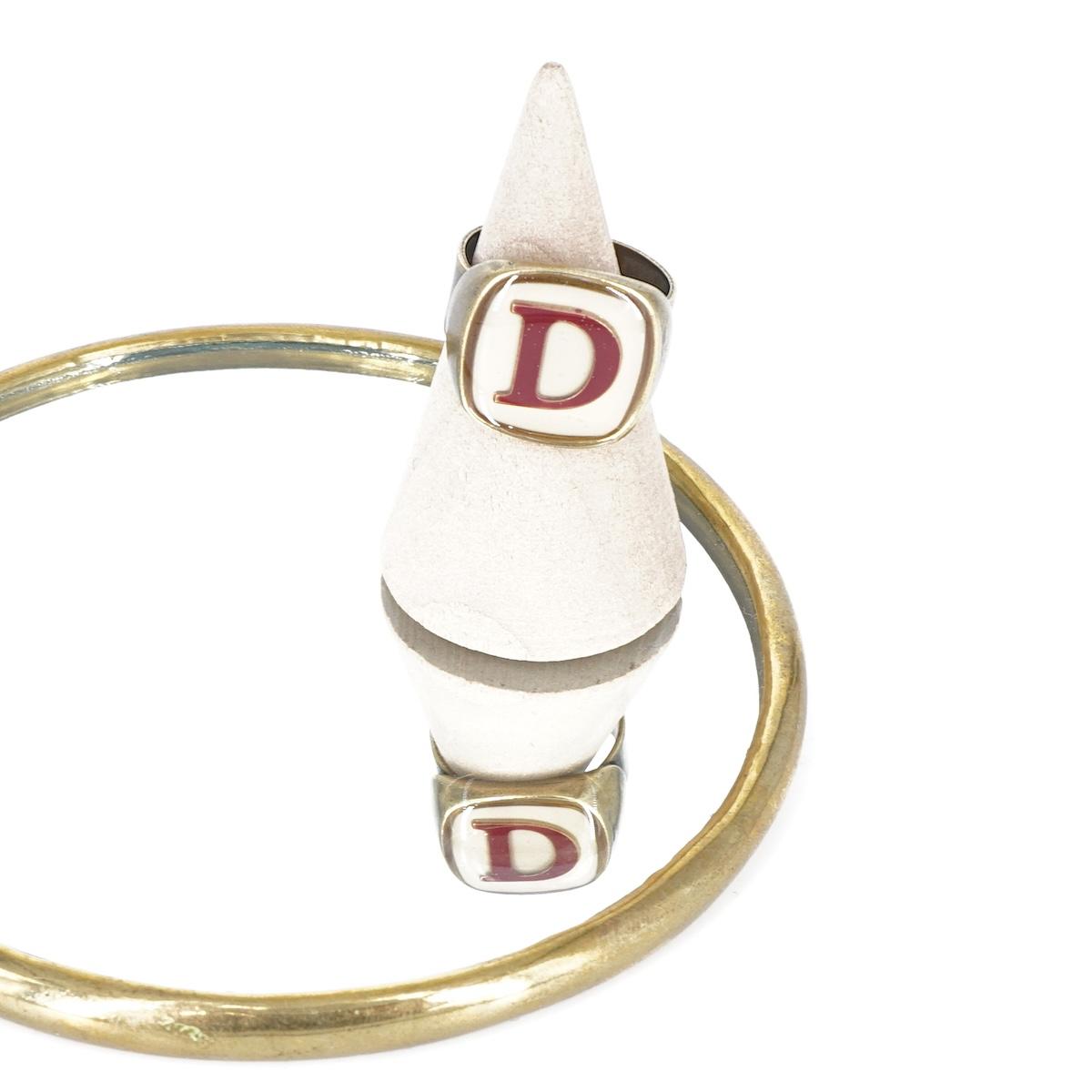 ANELLO LETTERA D AVORIO ANELLO LETTERA D AVORIO E BORDEAUX UNIQUE UNCONVENTIONAL DETAILS 