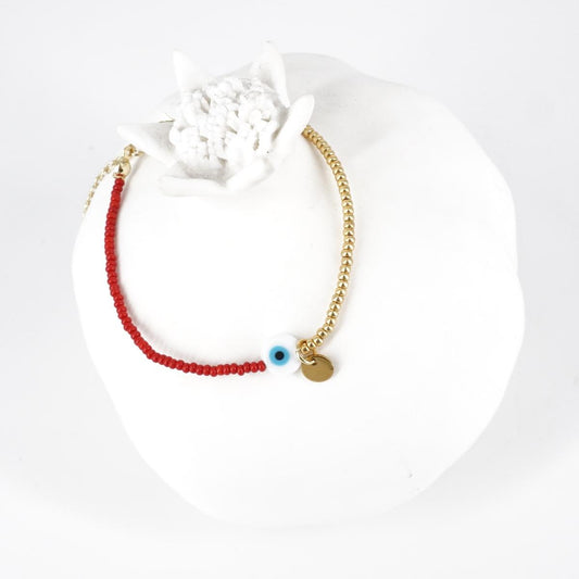 BRACCIALE OCCHIO PERLINE ORO E ROSSO