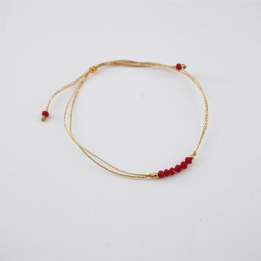 Braccialetto PERLINE FILO ROSSO BRACCIALETTO PERLINE FILO ROSSO NUSA DUA 