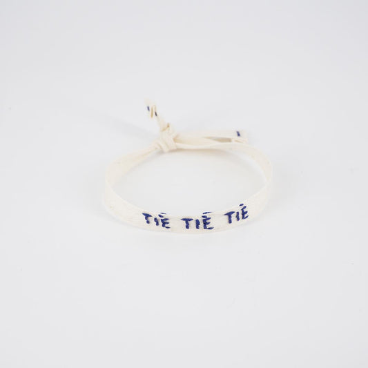 TIE TIE TIE white bracelet