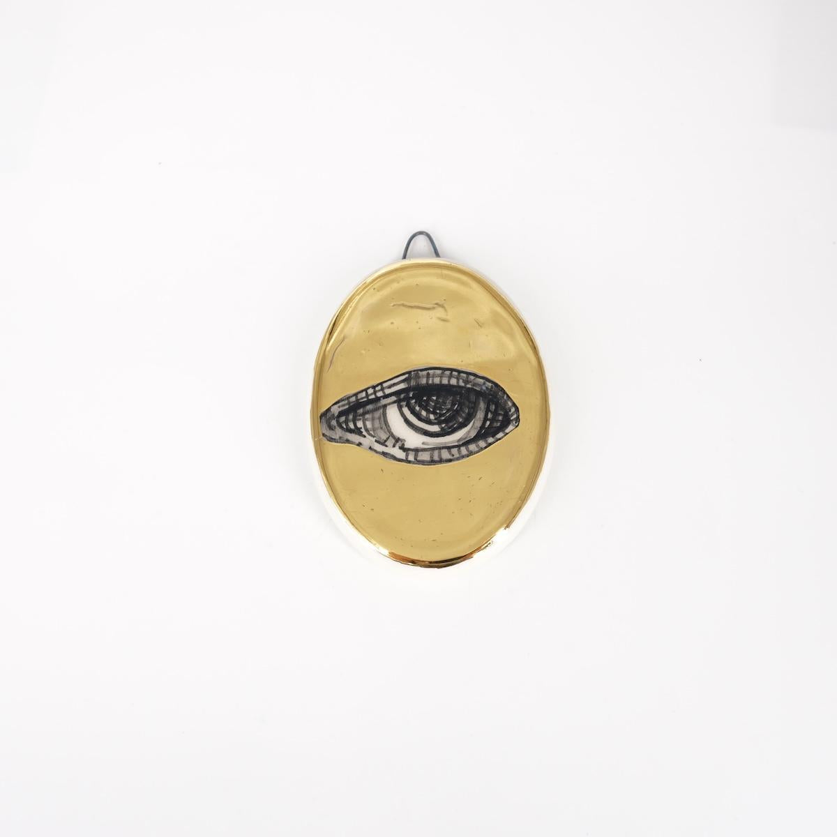 Ovalino OCCHIO fondo oro liscio