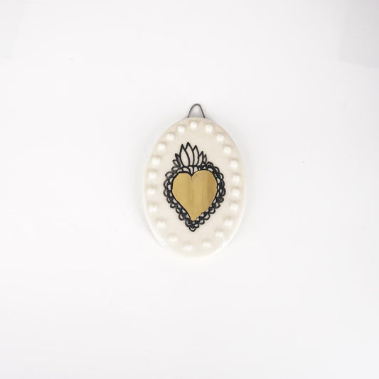 Ovalino EXVOTO fondo bianco con bollicine