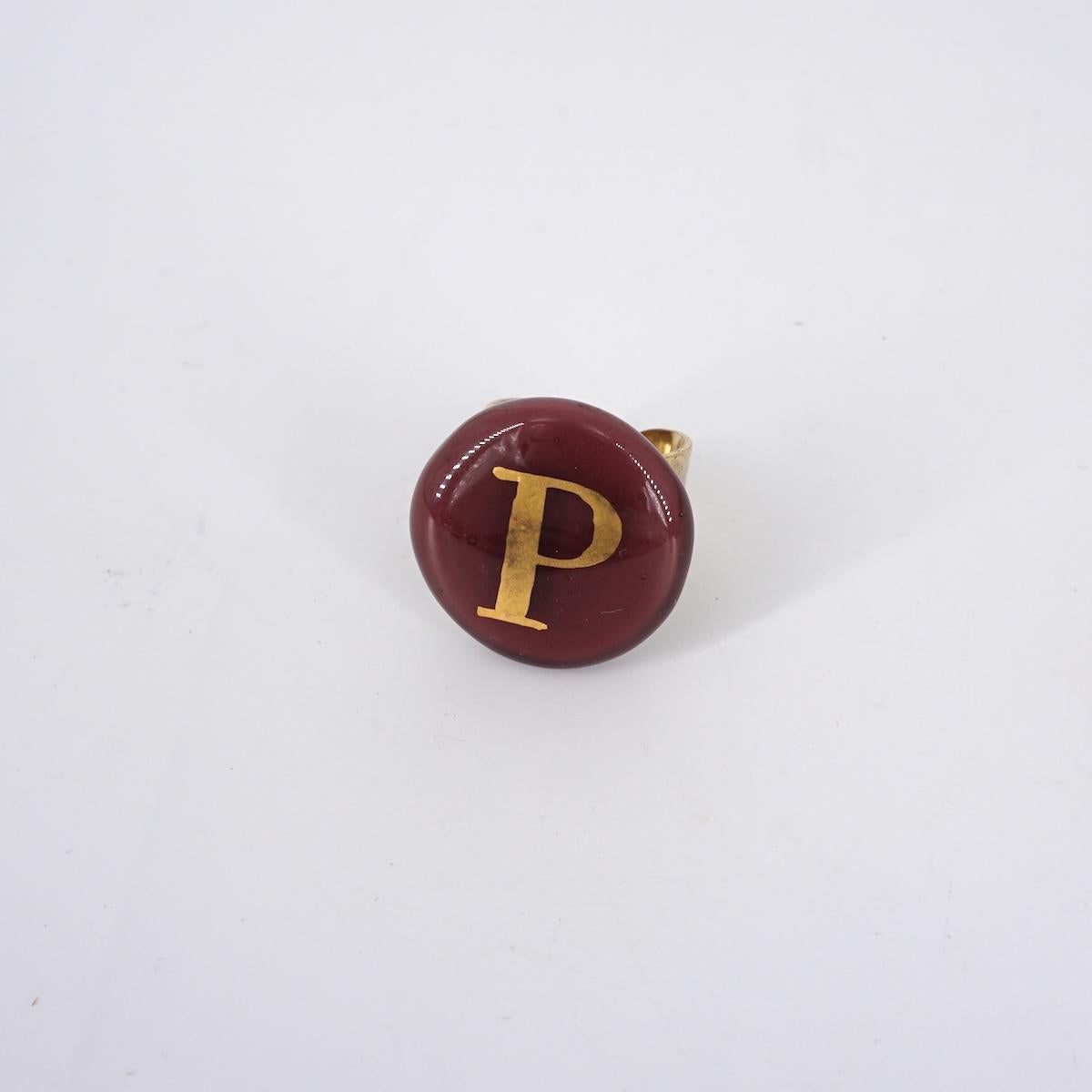 VETRO FUSO ANELLO LETTERAP PRUGNA