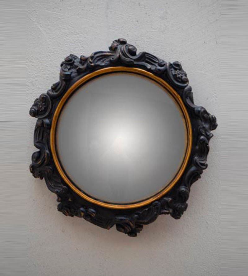 Convex black scrolls mirror
